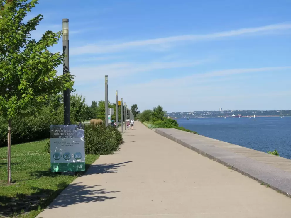 The long promenade with view of the blue water. 