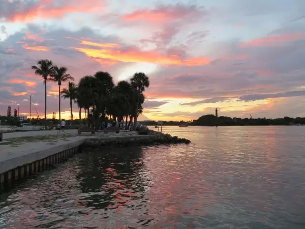 Walking to the end where you see views of the lighthouse, at sunset. 