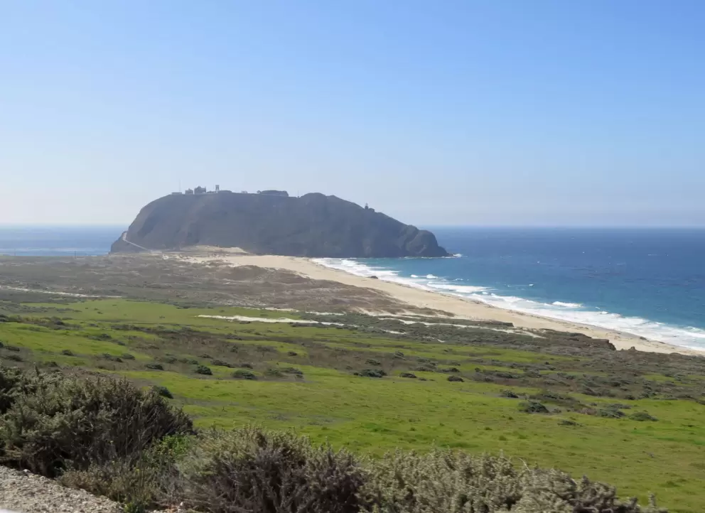 Point Sur Naval Facility, where there is a lighthouse on a large volcanic rock. 