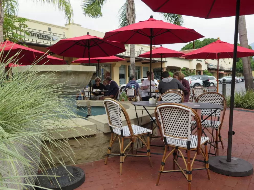 The outdoor seating around the fountain, at Renaud's. 