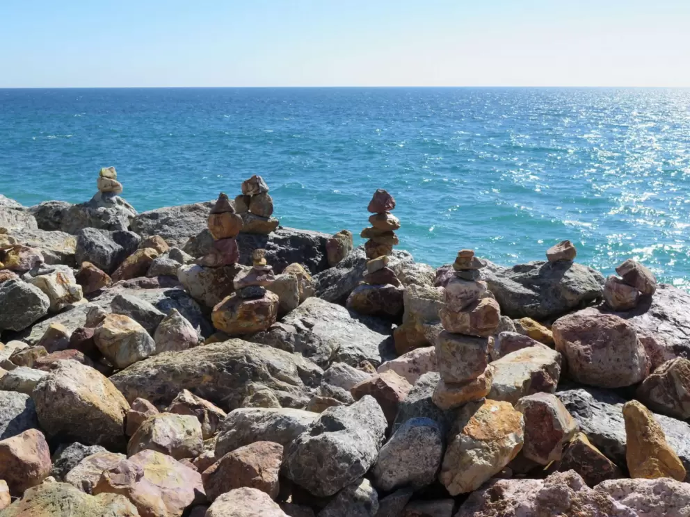 The rock statues and the sea!