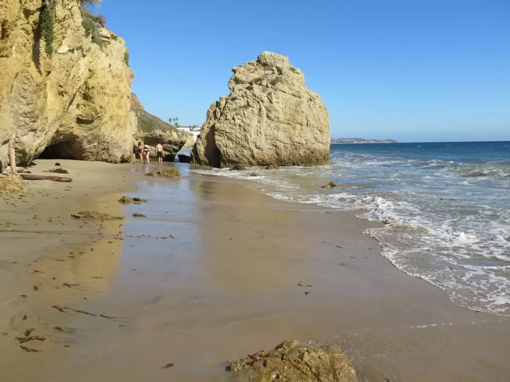 Looking down the beach at the amazing rock formations. 