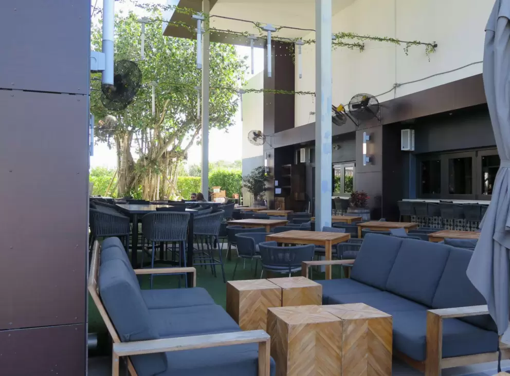 Seating outside Carmela Coffee Bar. 