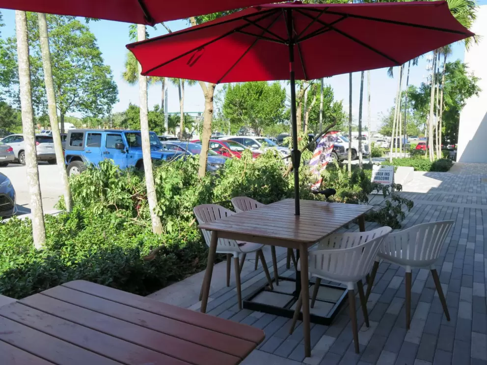 Seating outside Carmela Coffee Bar. 