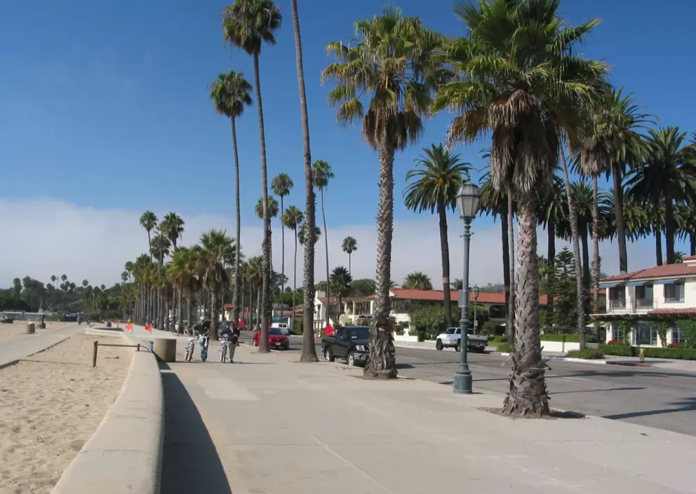 The wide sidewalk that runs near the bike path.