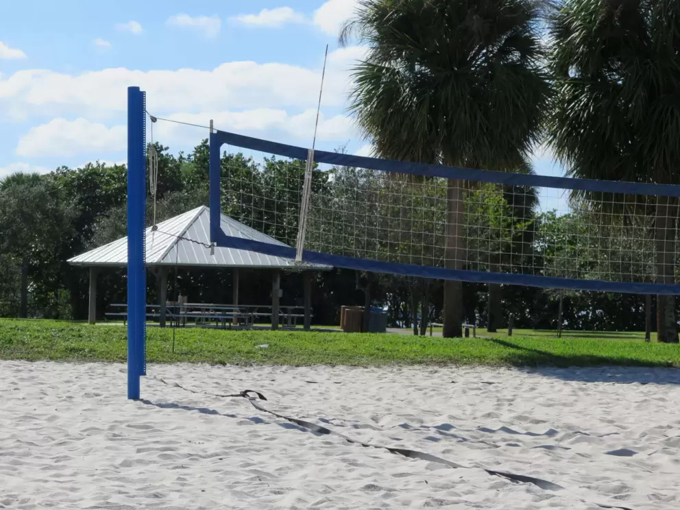 White sand volleyball court. 