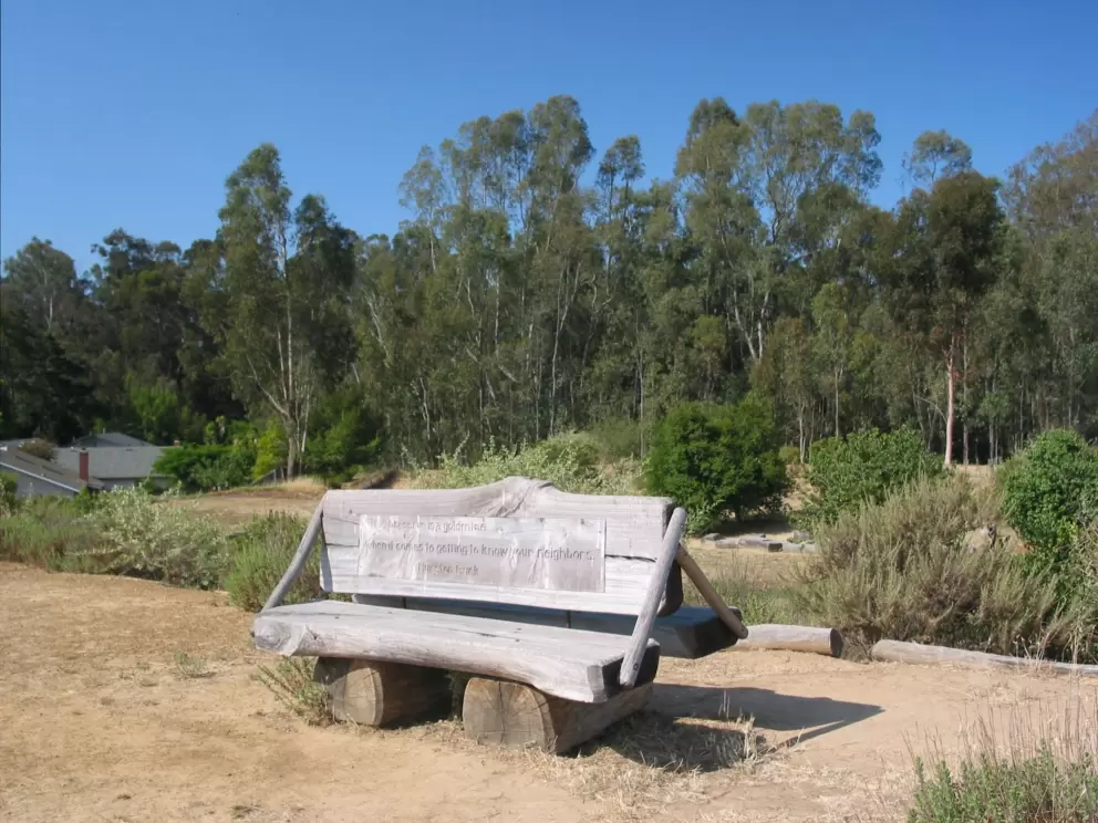 A place to sit at a trail entrance on Coronado Dr- see the eucalyptus forest behind.