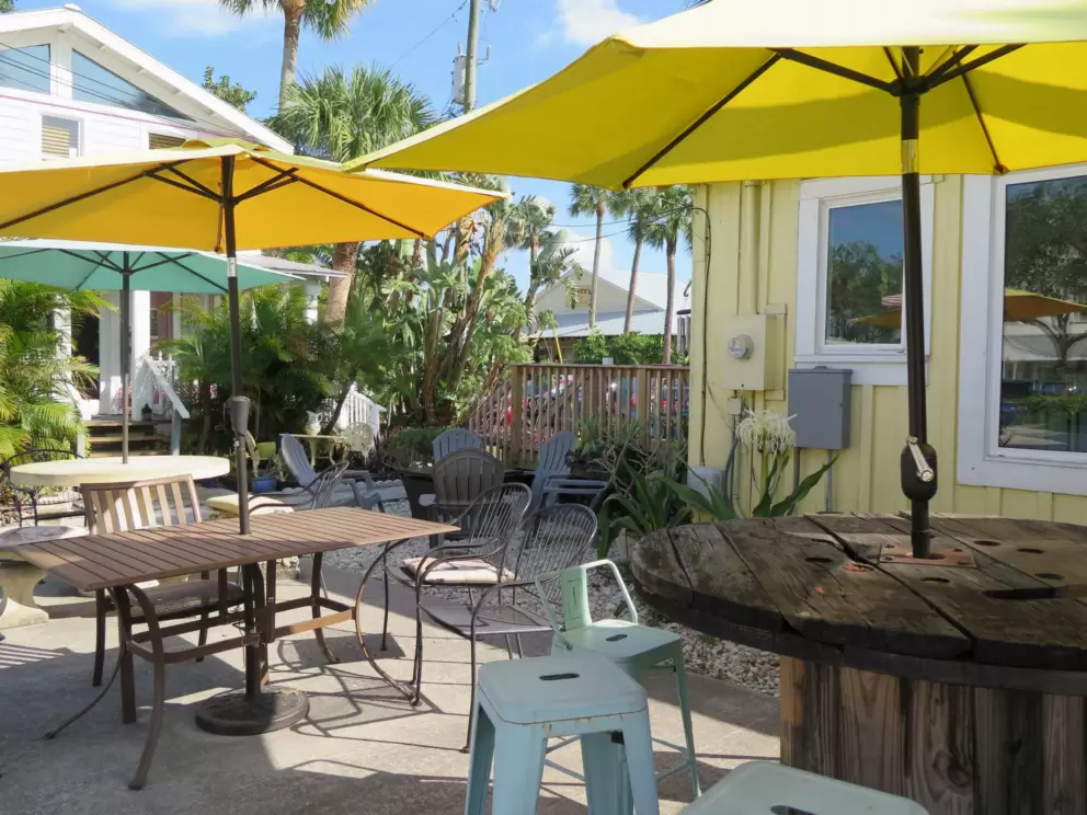Yellow umbrellas keep you cool at Bunk House Coffee Bar. 