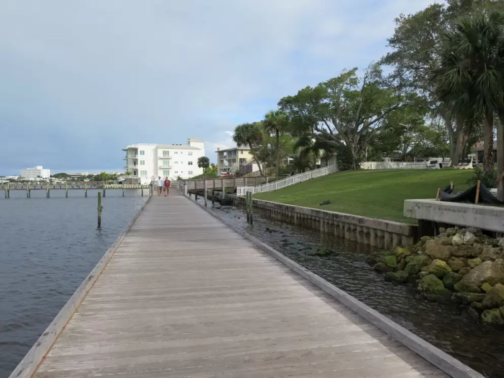 The beautiful boardwalk and sloped lawn on the water's edge.