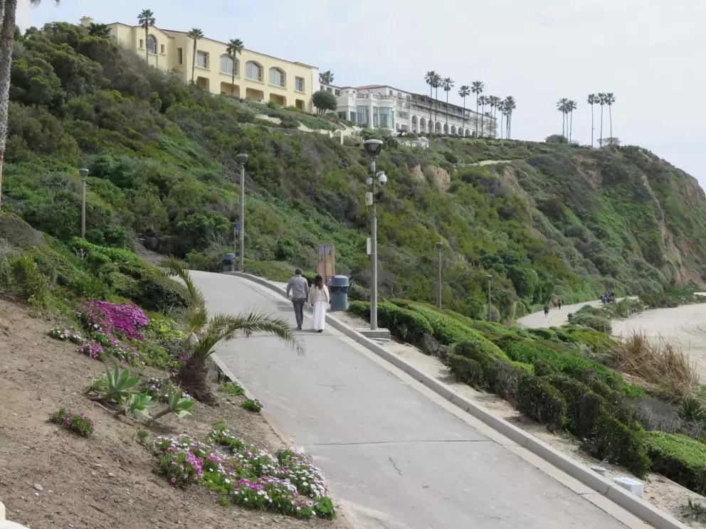 A couple walks along the path. 