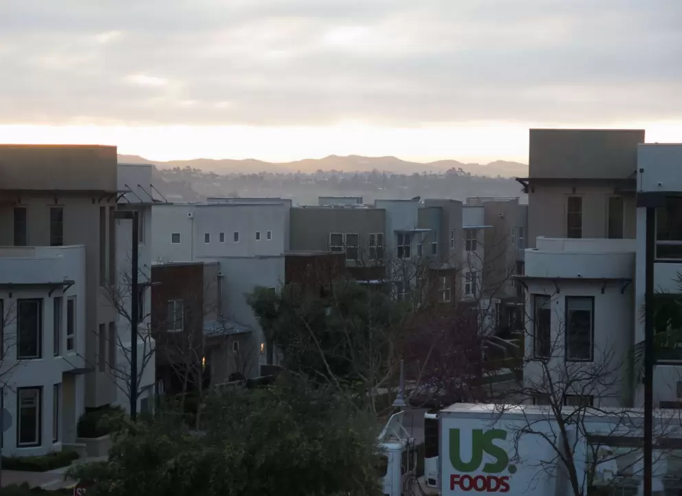 Sunrise over the mountains in the distance. 