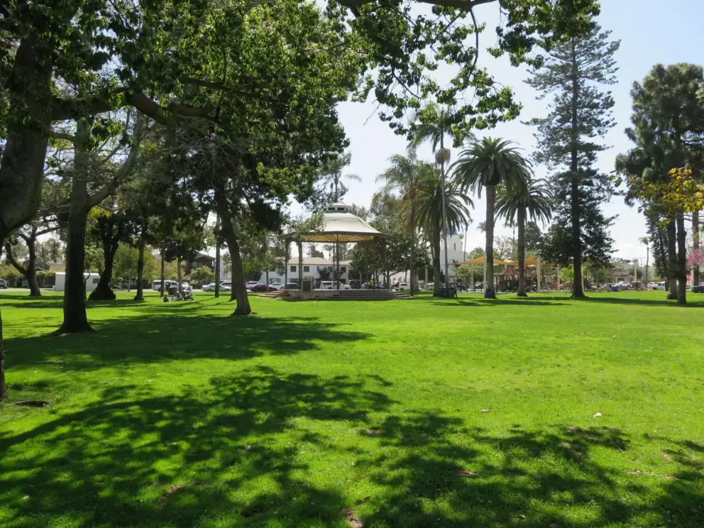 Gazebo and lush lawn. 