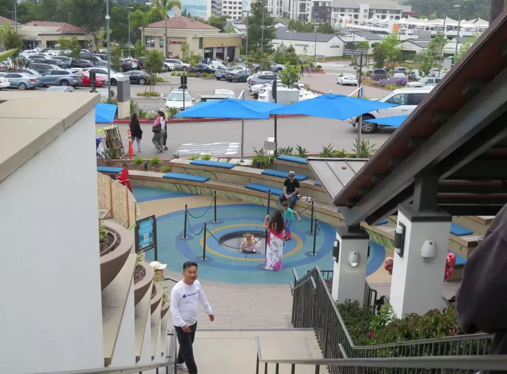 Kids checking out the trampoline downstairs. 