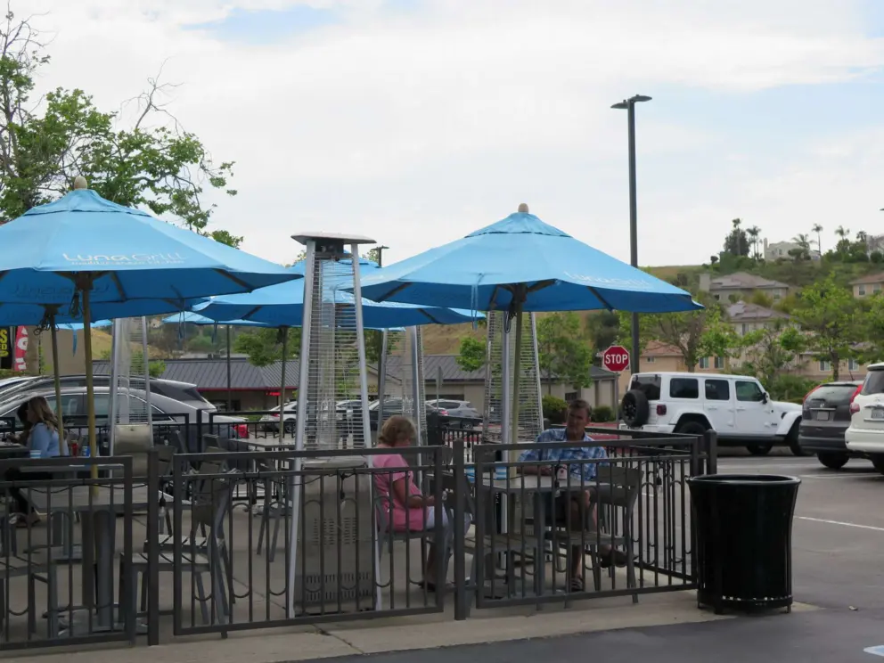 Colorful umbrellas outside Luna Grill. 