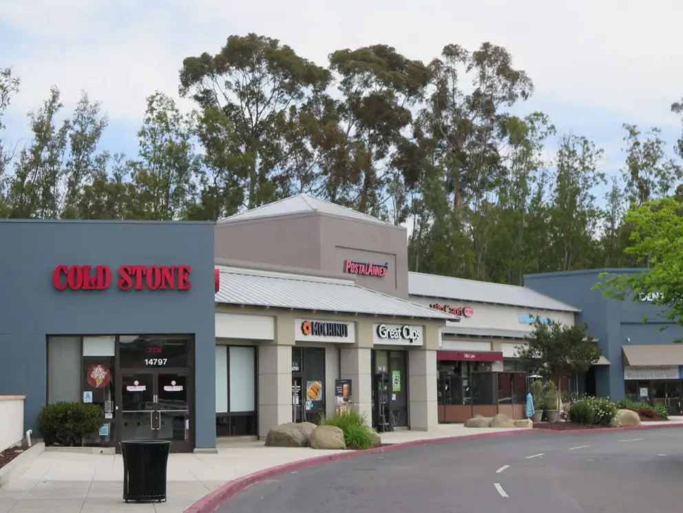 Cold Stone Creamery and eucalyptus trees behind. 