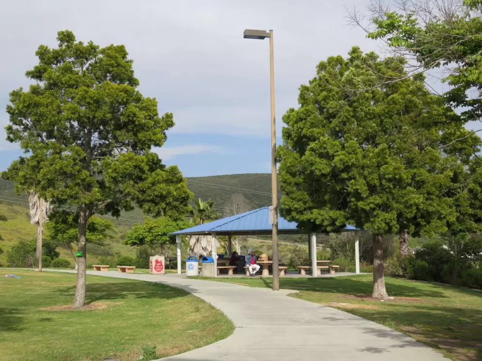 The walking path goes past a picnic pavilion. 