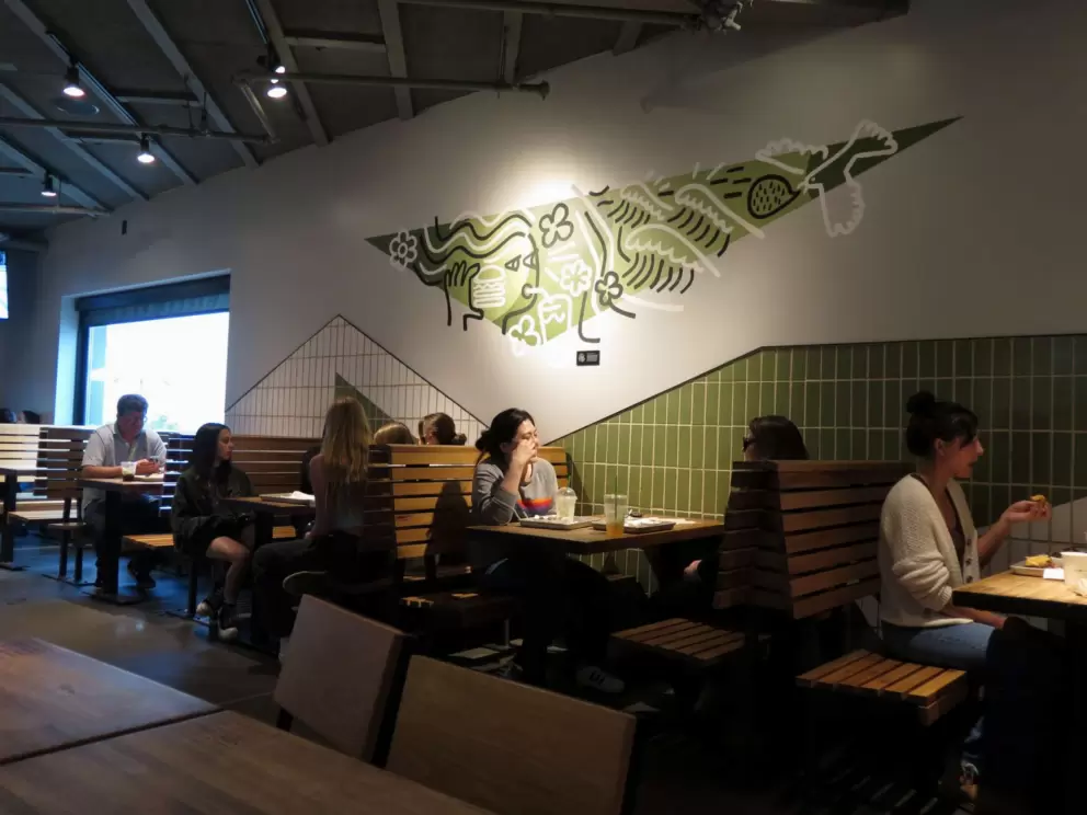 Colorful booths at Shake Shack. 