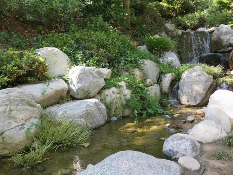 Waterfall, stream, and lovely boulders. 