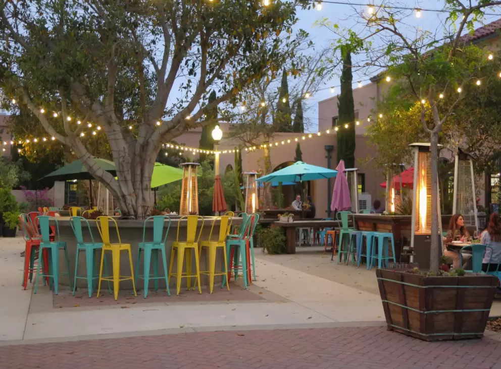 Strung lights and colorful chairs at Carruth Cellars. 
