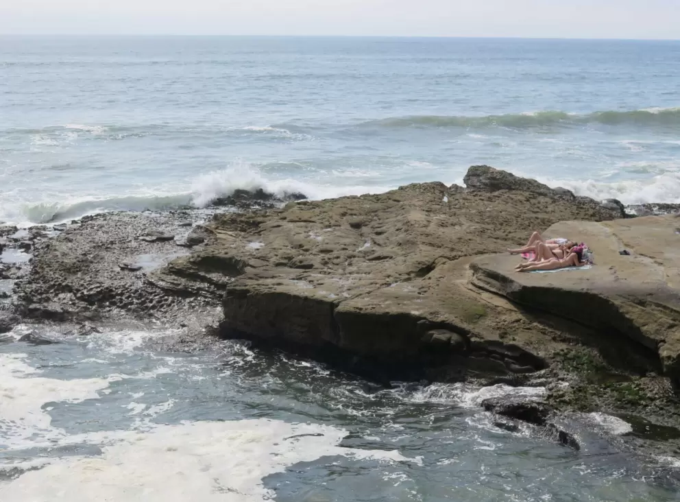 Waves crashing on the rocks. 
