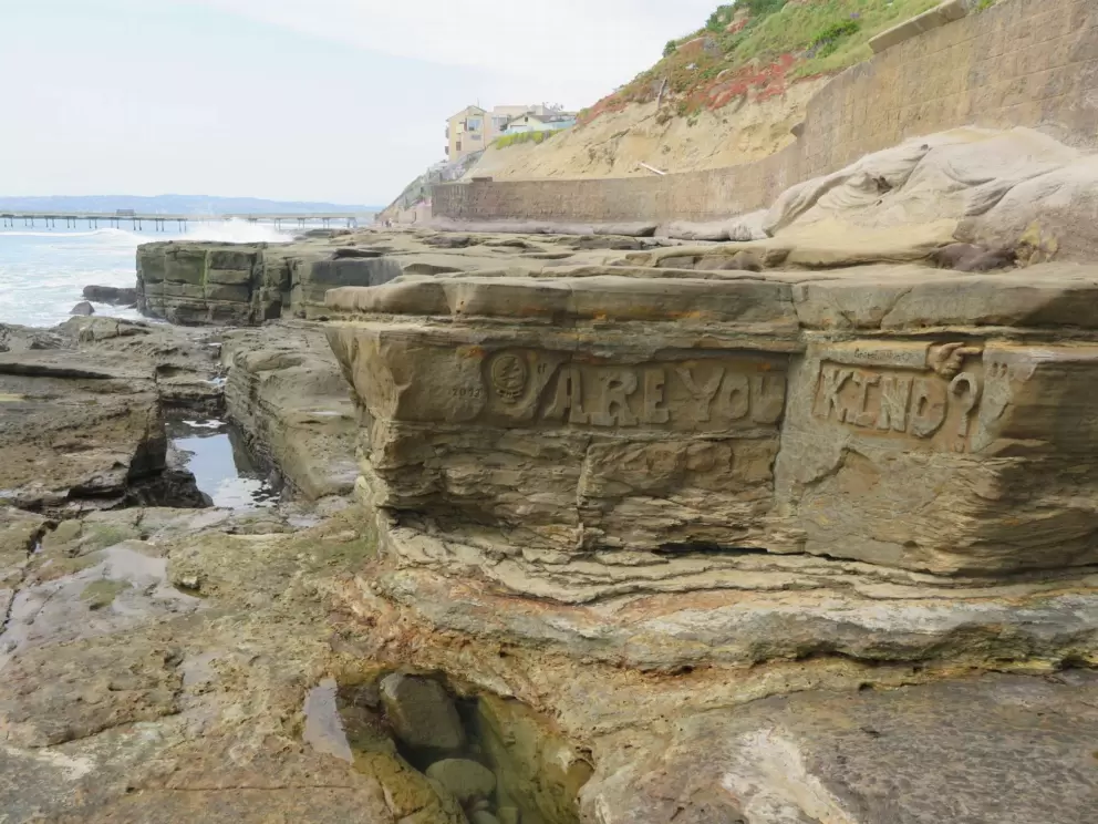 "Are you kind?" carved in the rocks. 