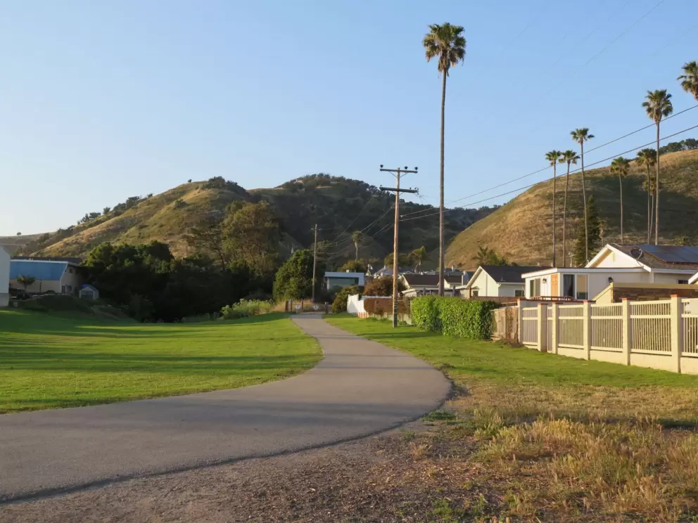 Asphalt path leading to the playground. 