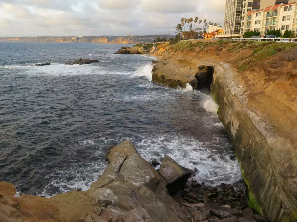 Waves crashing against sea caves. 