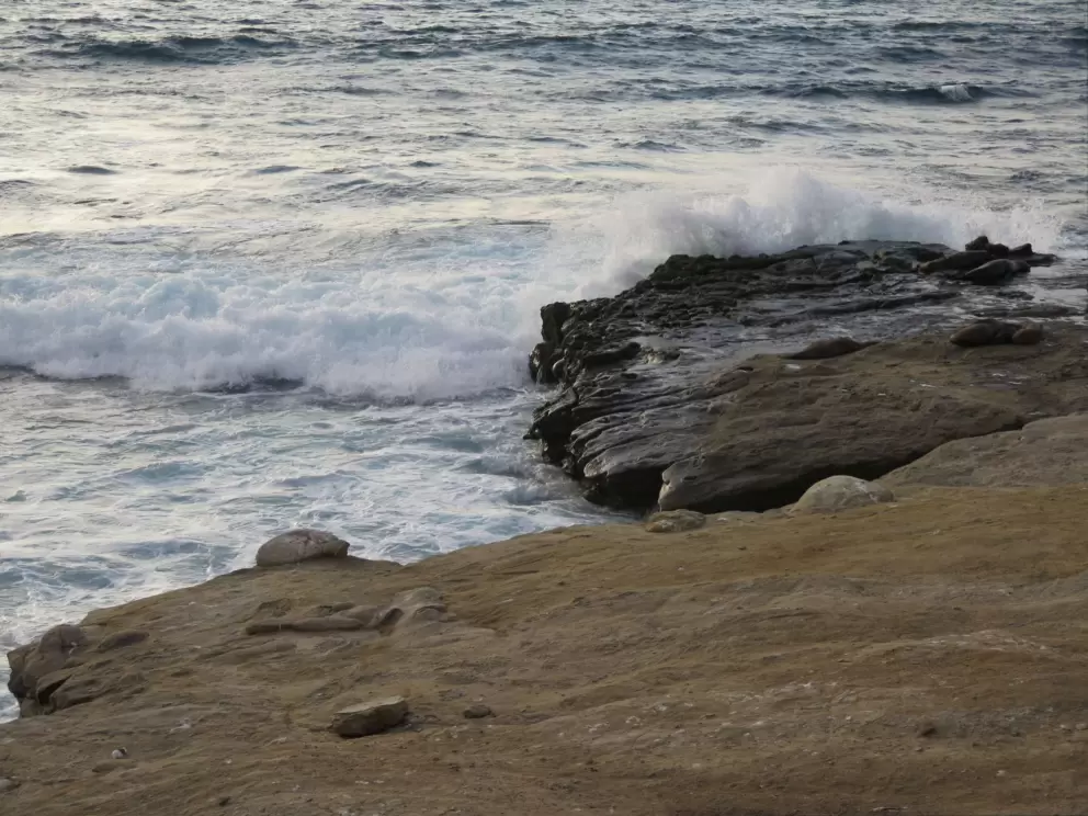 Waves crashing on the rocks. 