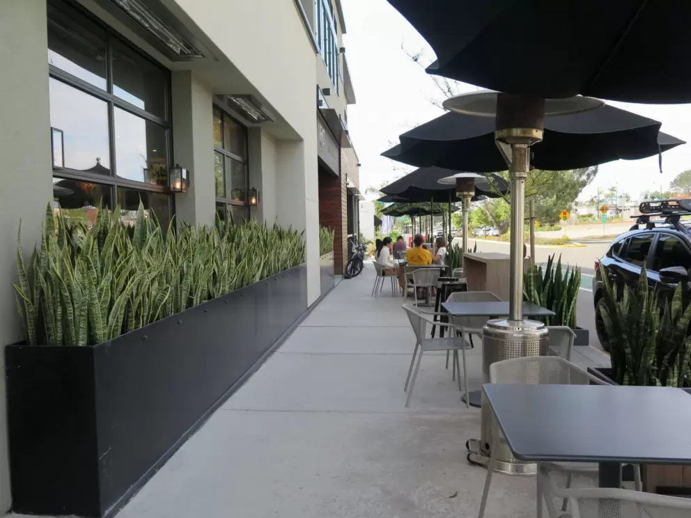 Walking past a cafe. 