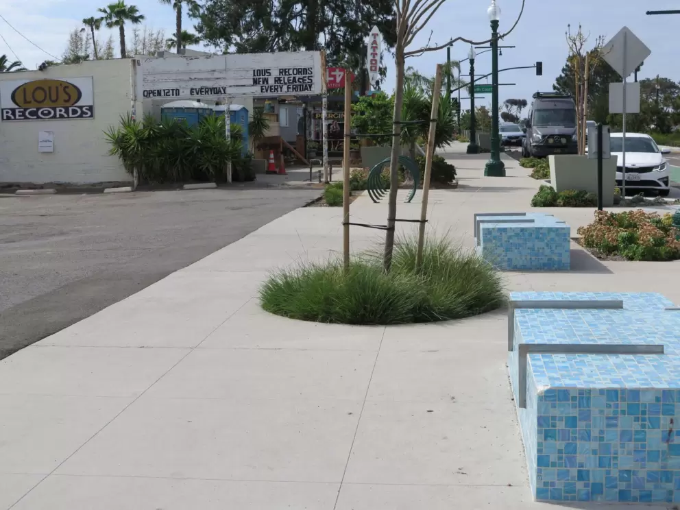 Tiled benches along Coast Highway 101 near Lou's Records. 