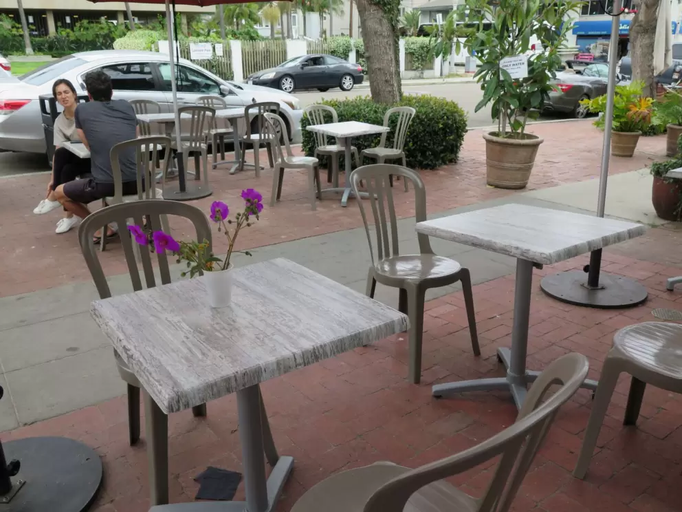 Seating outside Brick and Bell. 