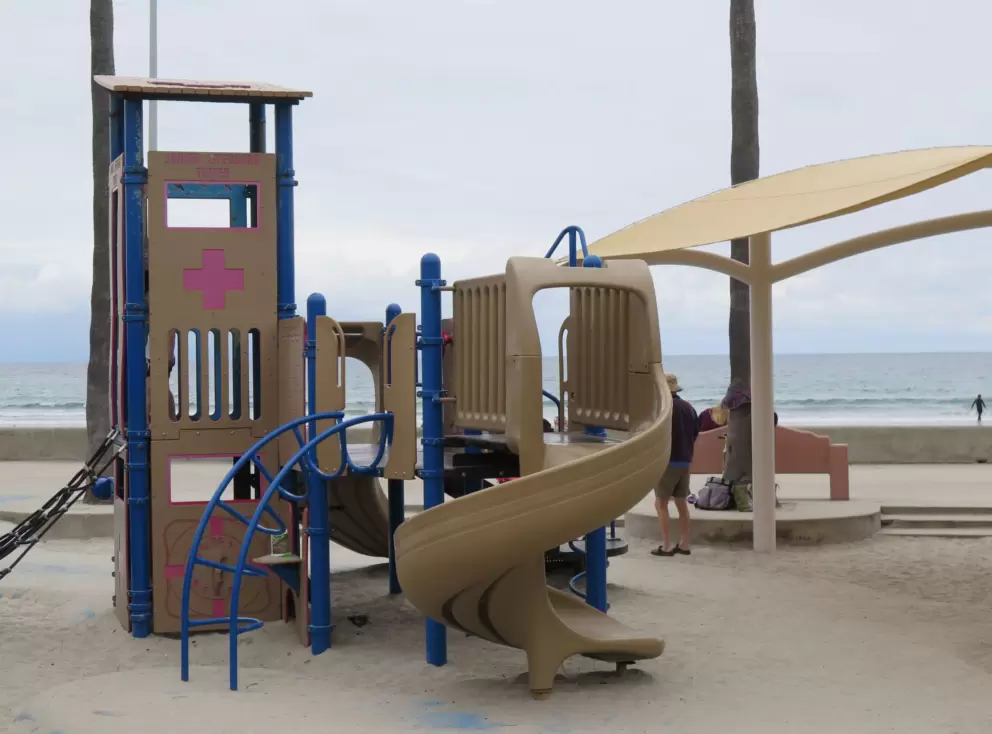 Twisty slide and pretend lifeguard station. 