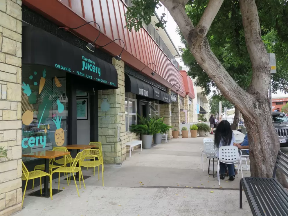 Cute seating outside Parakeet Juicery. 