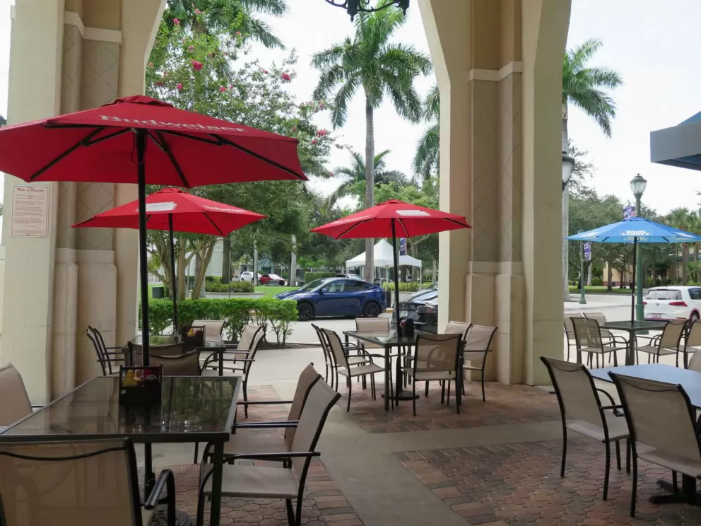 Outdoor seating under huge arches. 