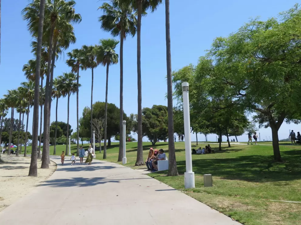 Wide path by the lawn and lighthouse. 