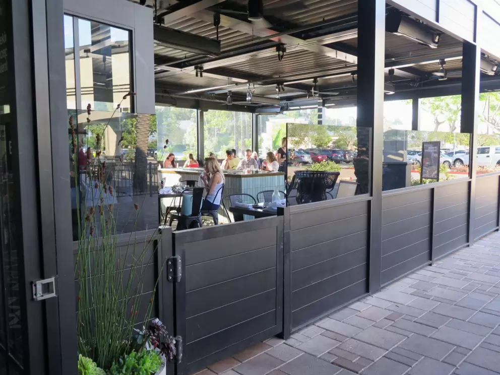Outdoor seating at Eureka! This is a restaurant at Commons at Aliso Viejo. 