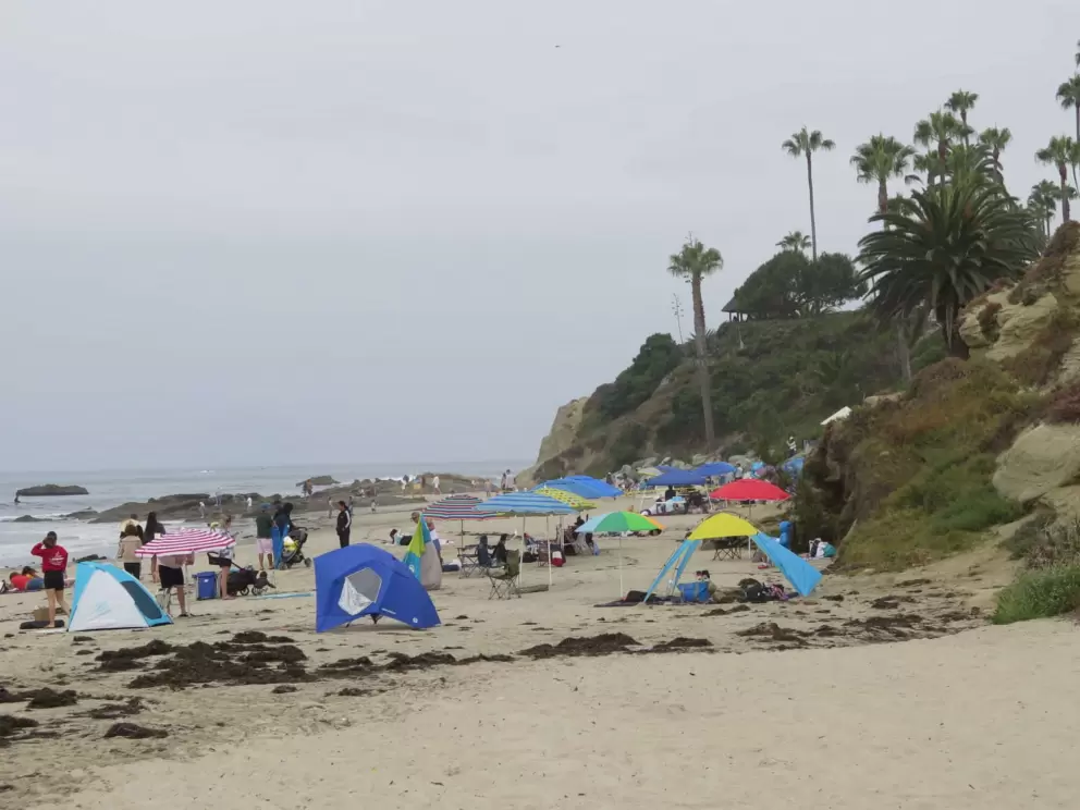 Main Beach with many sun tents and umbrellas. 