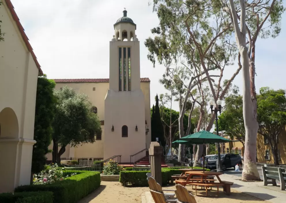 Laguna Presbyterian Church, with adirondack chairs and eucalyptus trees in front. 