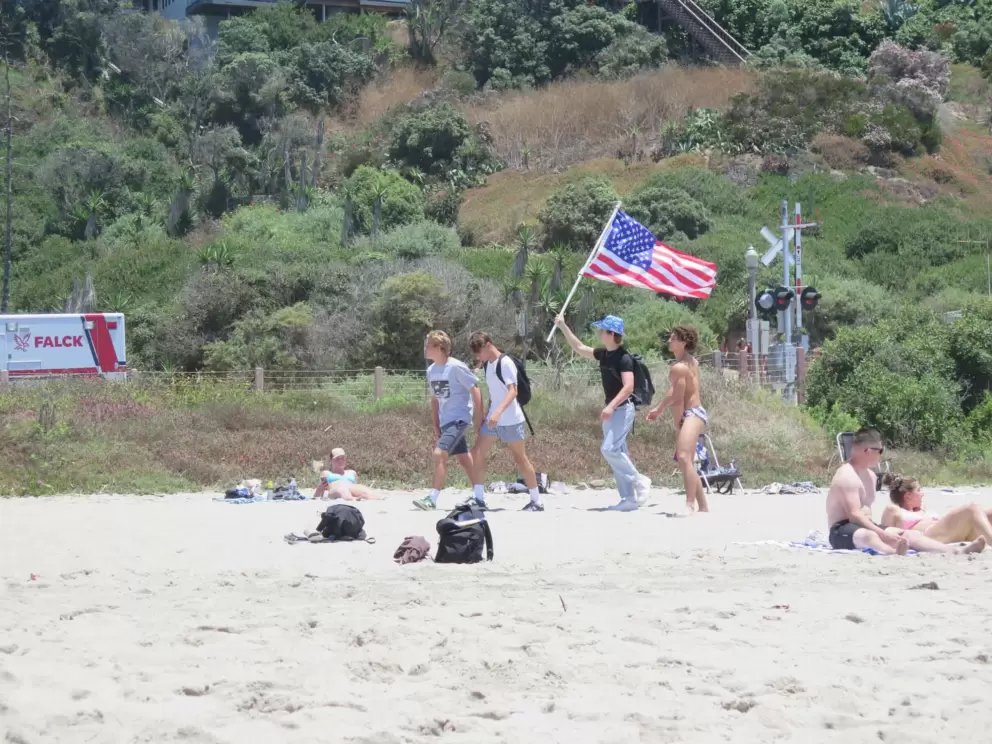 Party crowd with an American flag on July 4. 