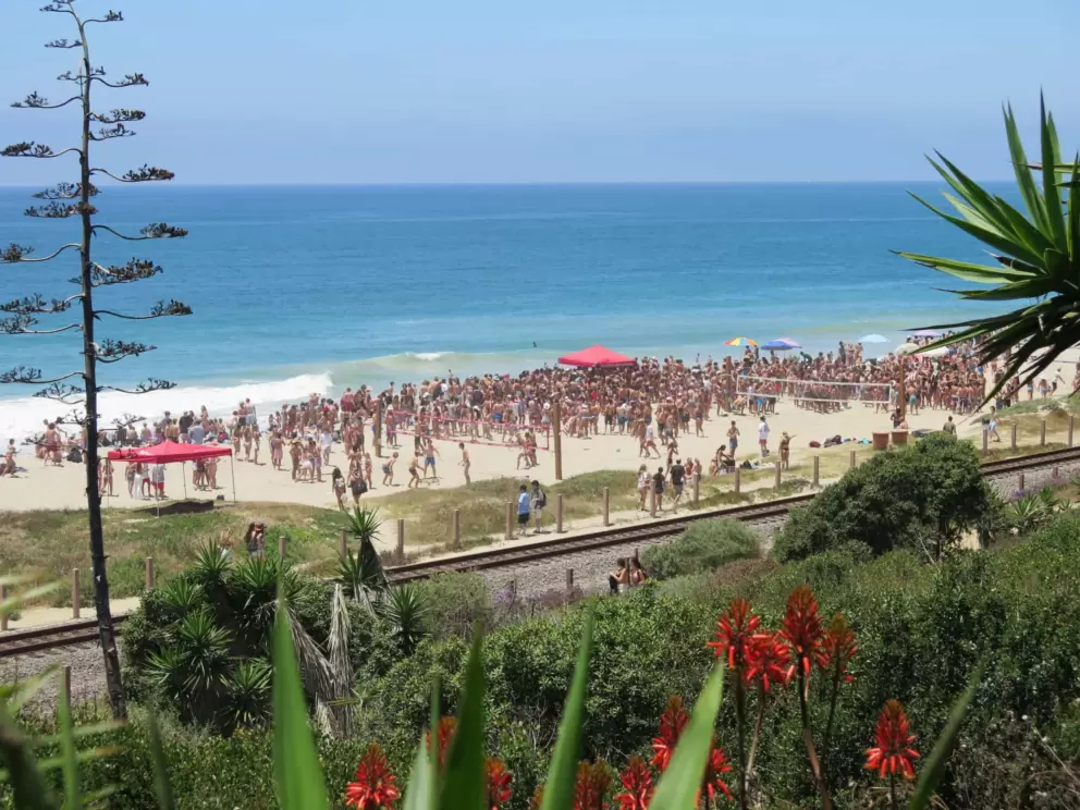 A huge crowd gathers on the beach for July 4. 