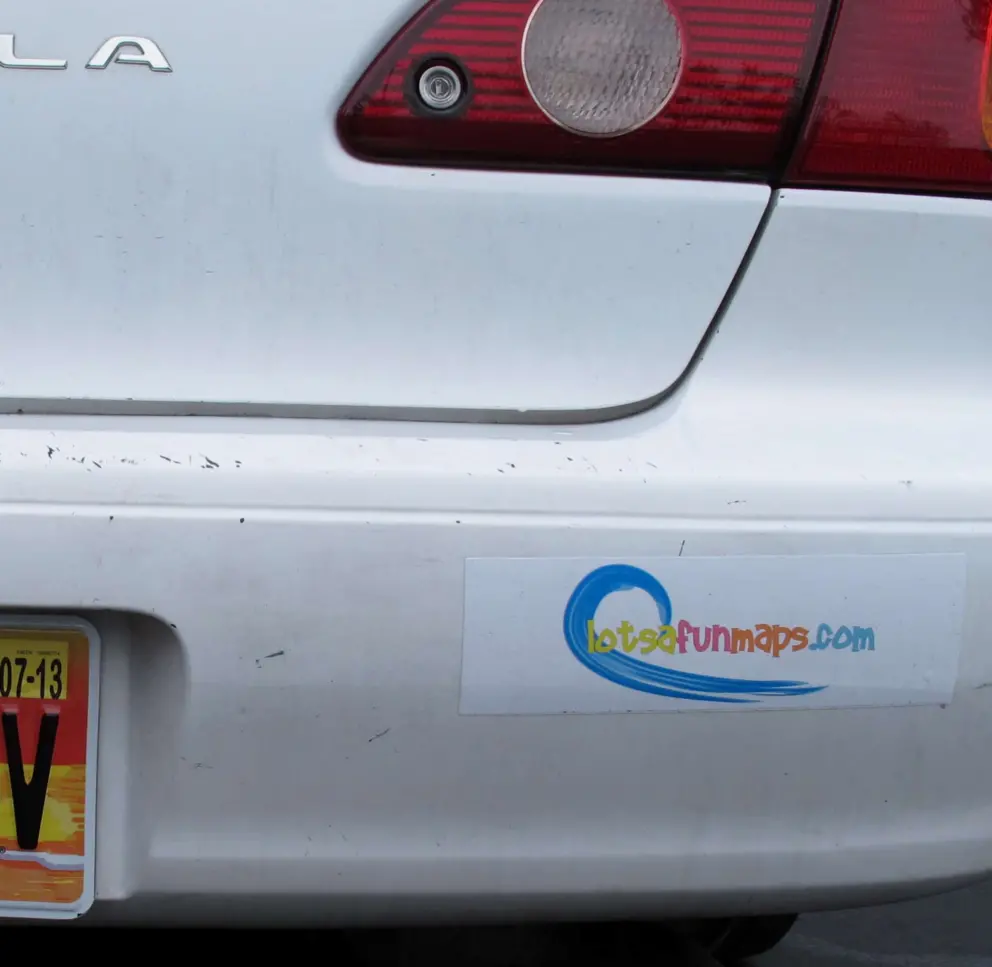 Our LotsaFunMaps bumper sticker, on our trusty Corolla funmaps-mobile!