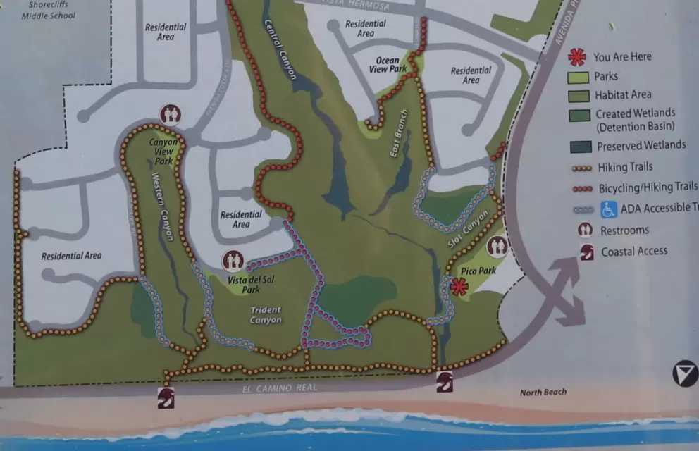 Map with parks, restrooms, hiking trails, bicycling trails, and ADA accessible trails. 