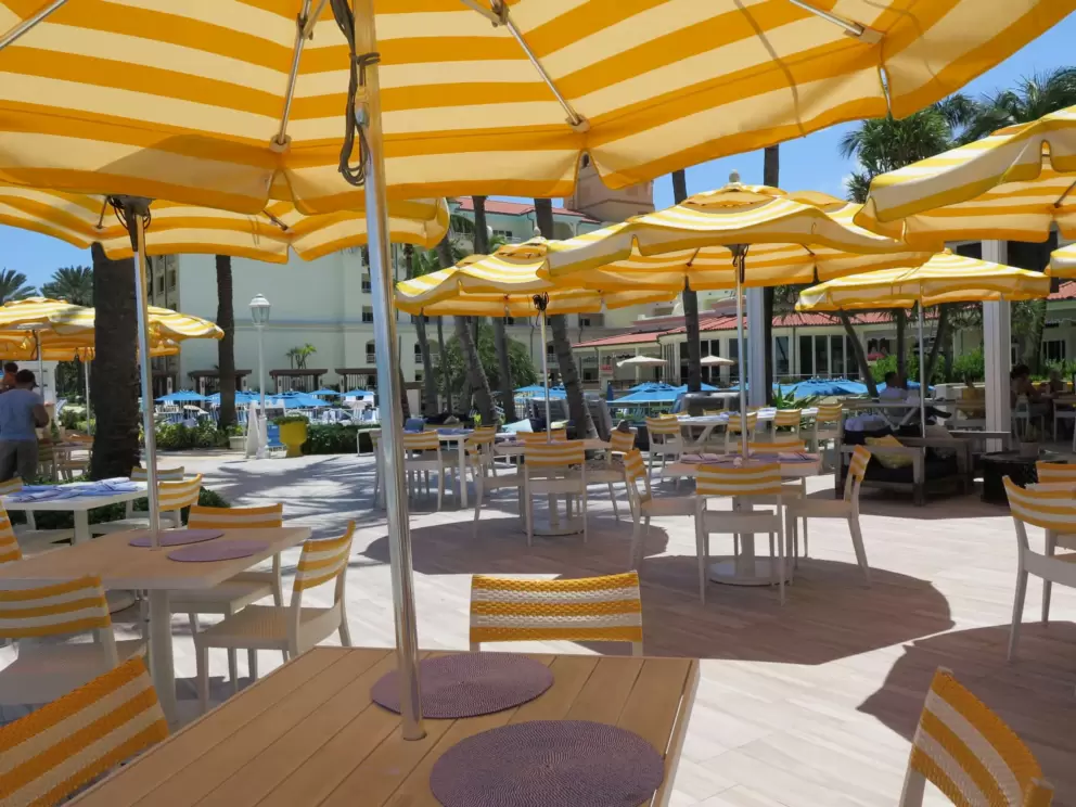 The stripey chairs and stripey umbrellas make for a festive atmosphere. 