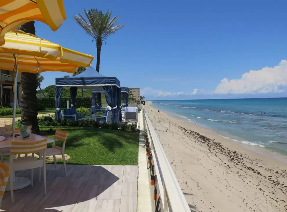 The narrow strip of sand below Breeze Open Kitchen. 