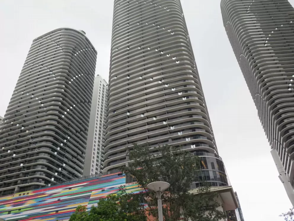 Looking up at the skyscrapers.