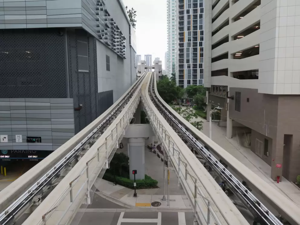 The Metromover tracks run between the buildings, bringing you here!