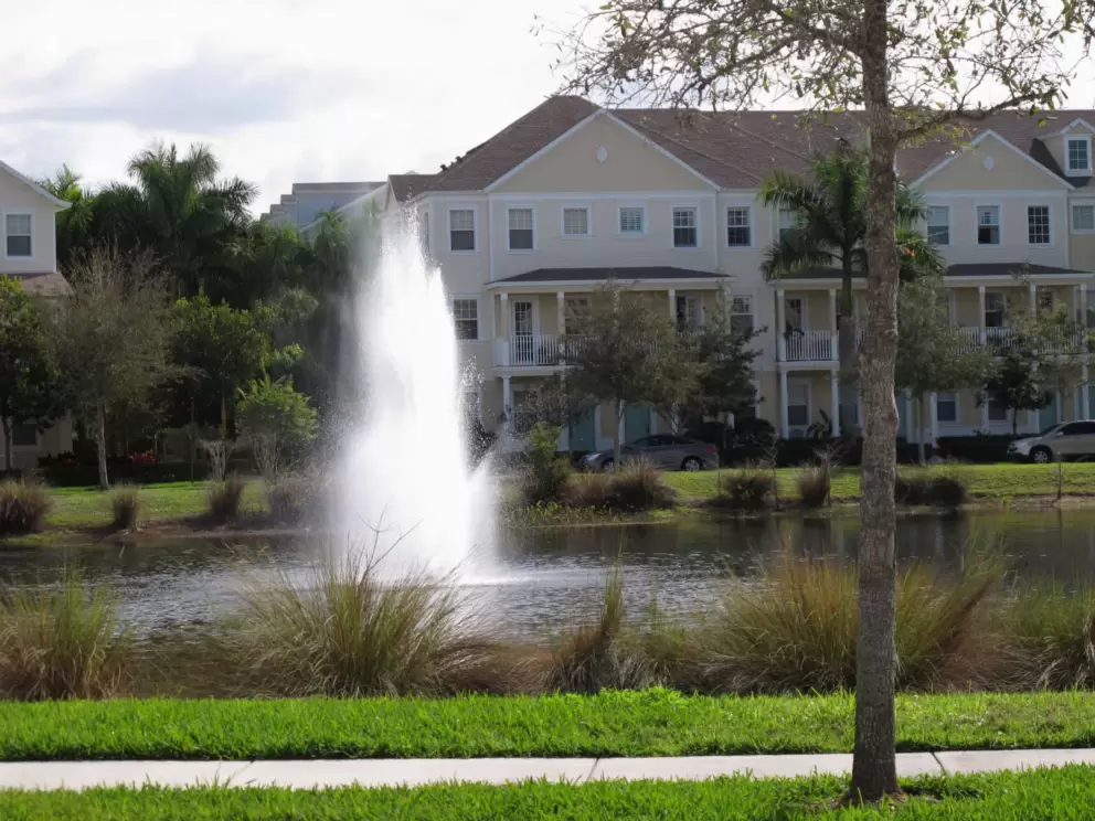 High fountain in the large pond at Thatch Palm Circle, in the Botanica neighborhood. 