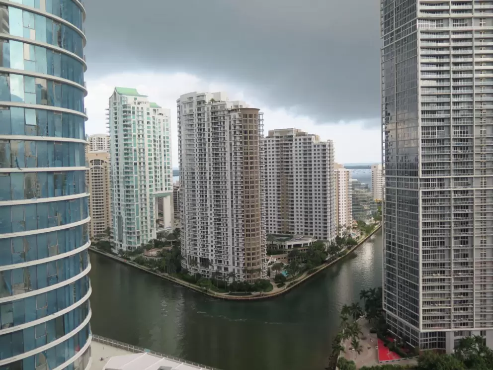 Rain clouds, taking the same shape as the skyline!