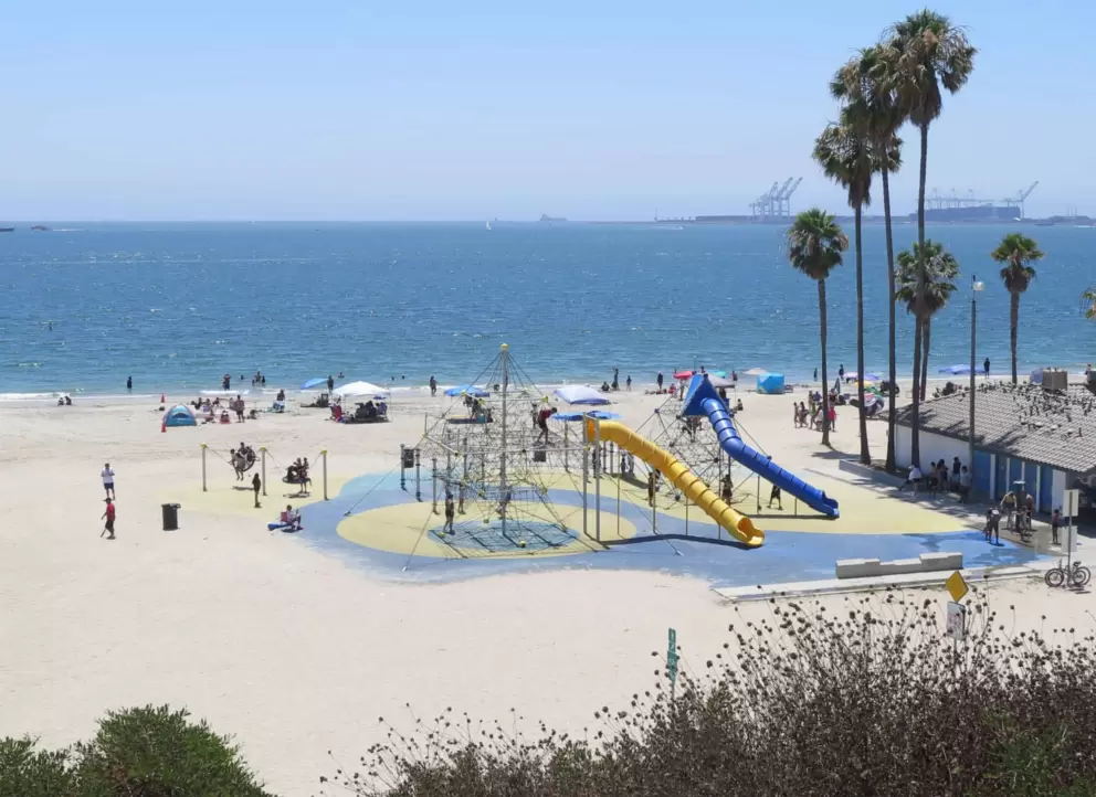 The playground on the sand, with huge slides and a giant climby!