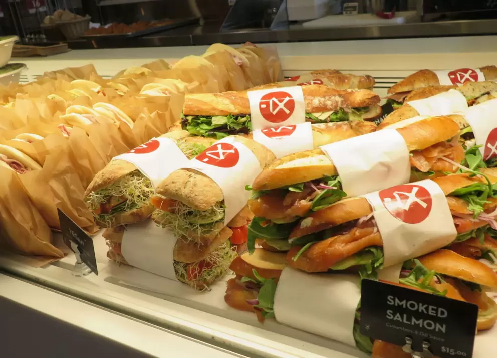 Baguette sandwiches stacked high, at Moulin Bakery.